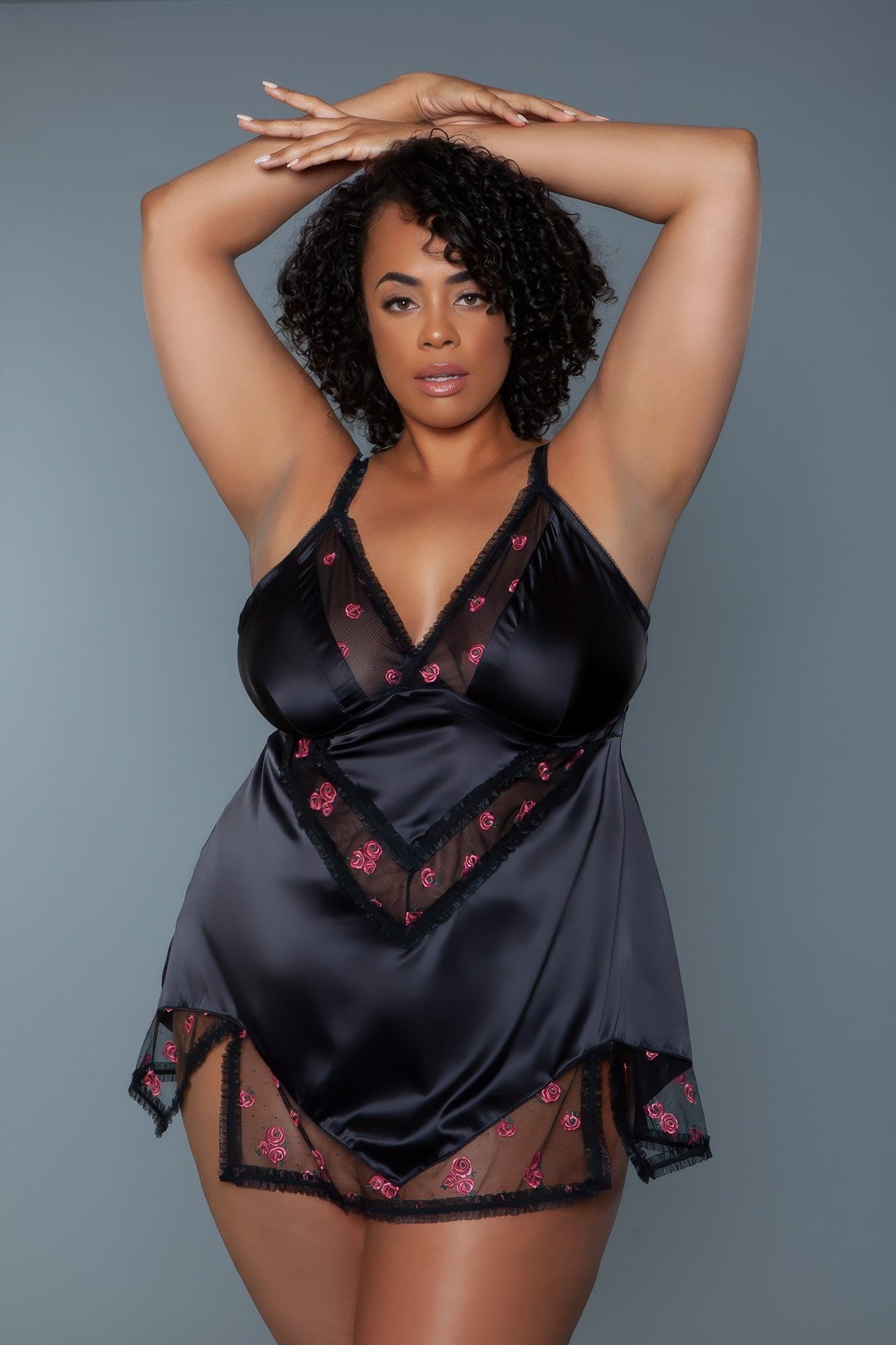 Black babydoll lingerie with pink rose embroidery, deep V neckline and mesh lace accents