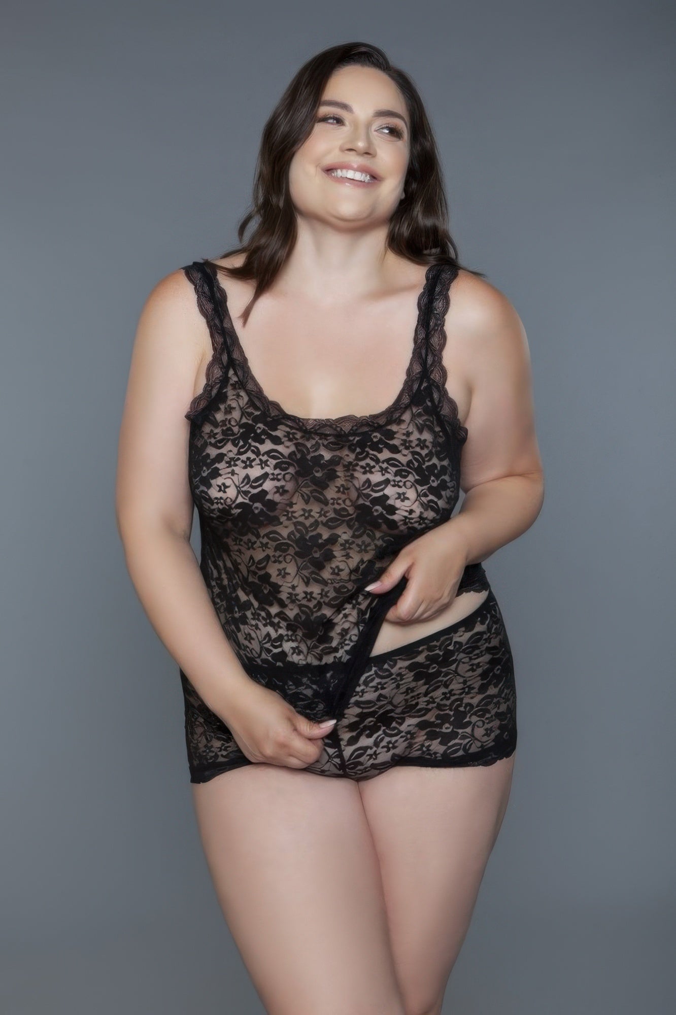 Black sheer floral lace cami and short set with scalloped neckline and thin straps.