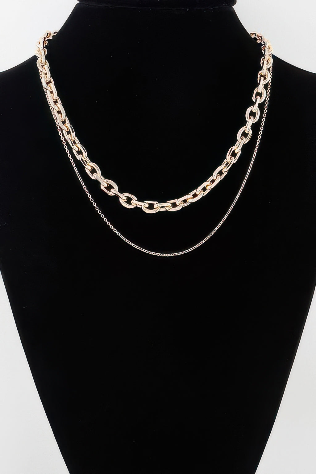 Link Necklace, gold-tone layered chain with oval link links and small connector charms