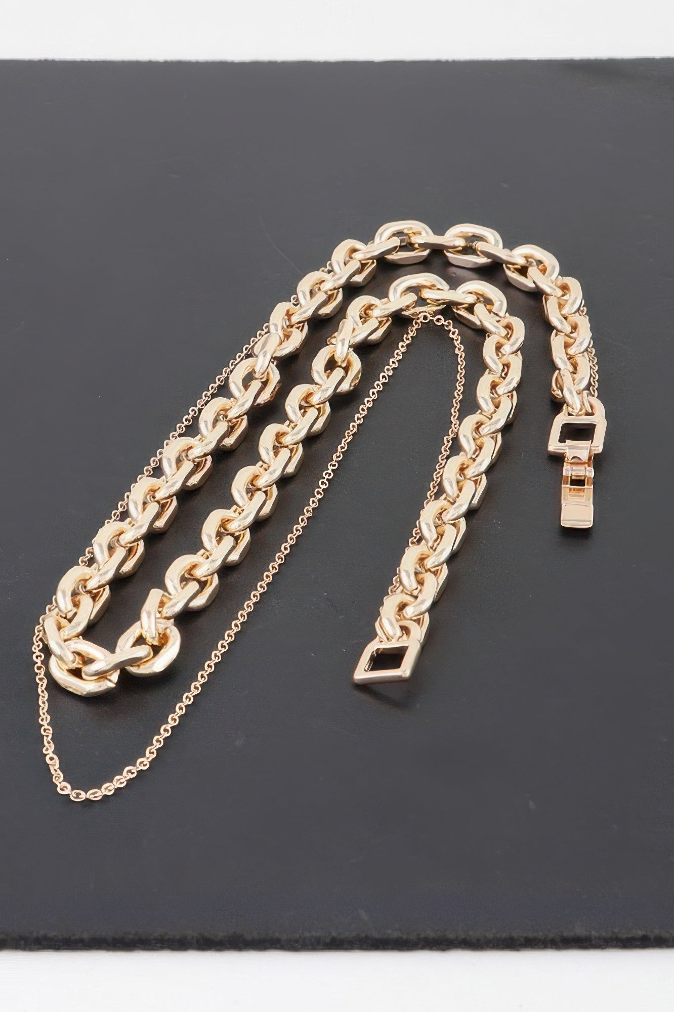 Gold-tone Link Necklace with multiple chain strands and rectangular clasp charms