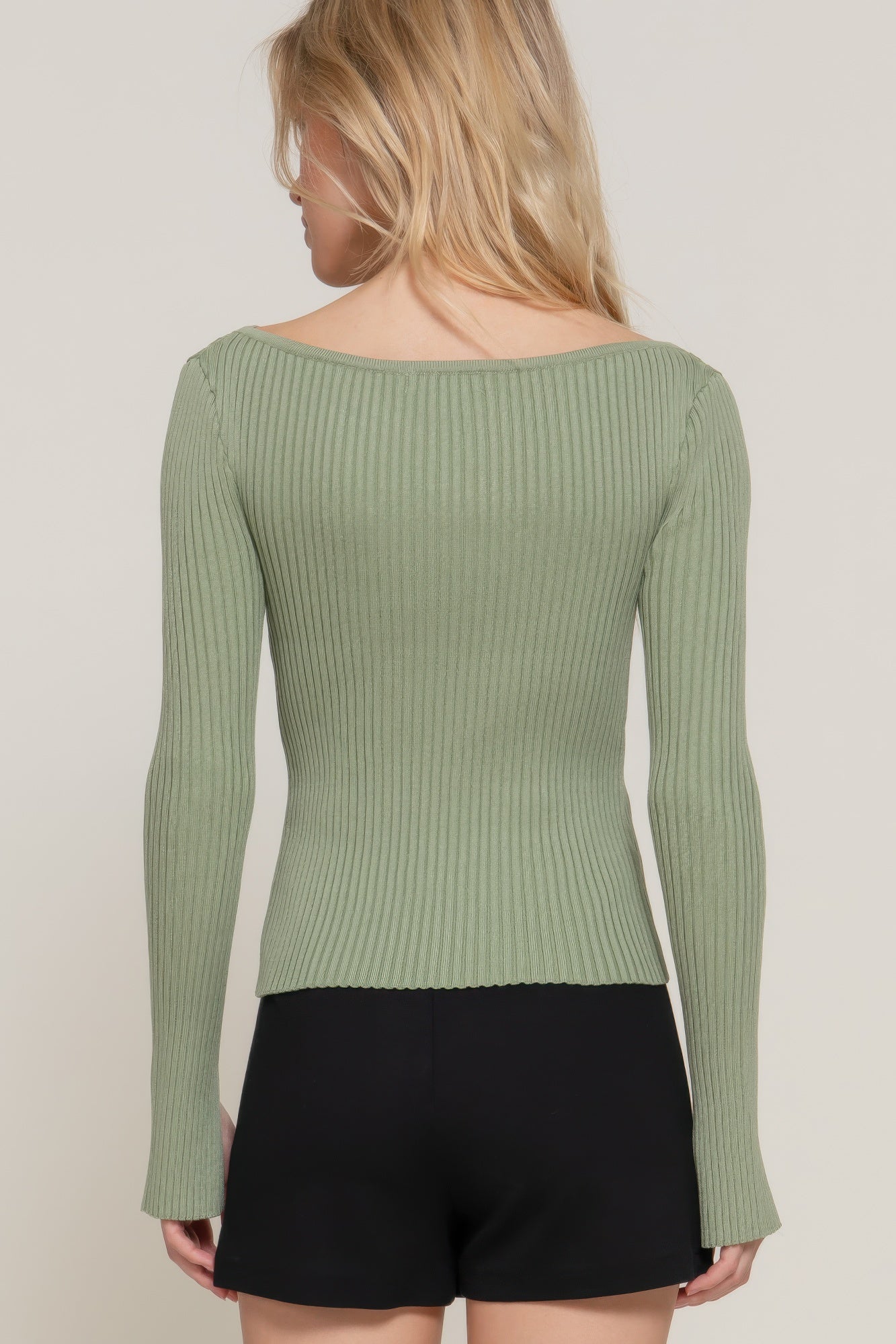 Sage long-sleeve boat neck sweater, back view with ribbed knit body.