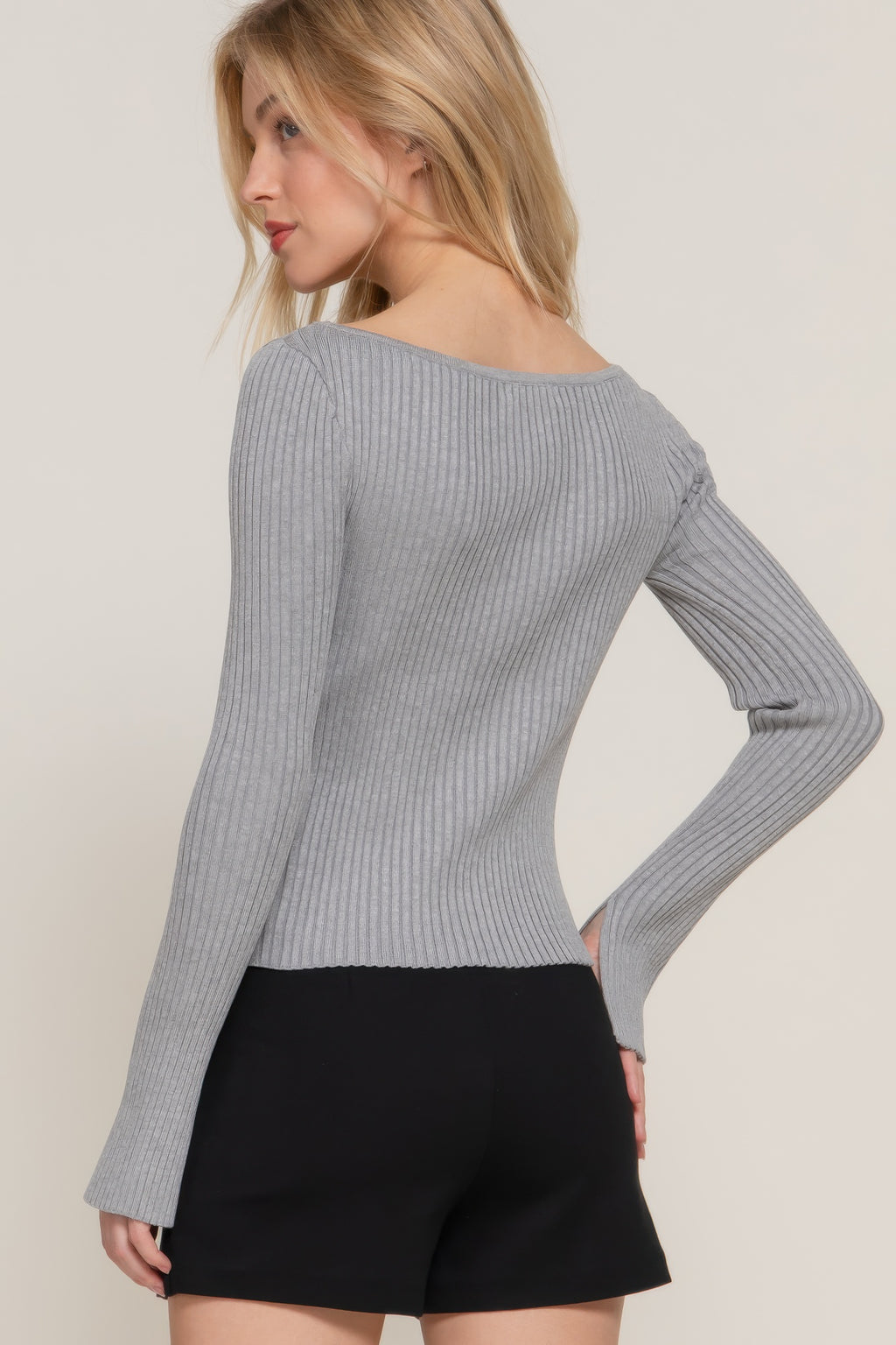 Heather grey long-sleeve boat neck sweater, side view with ribbed knit and fitted waist.