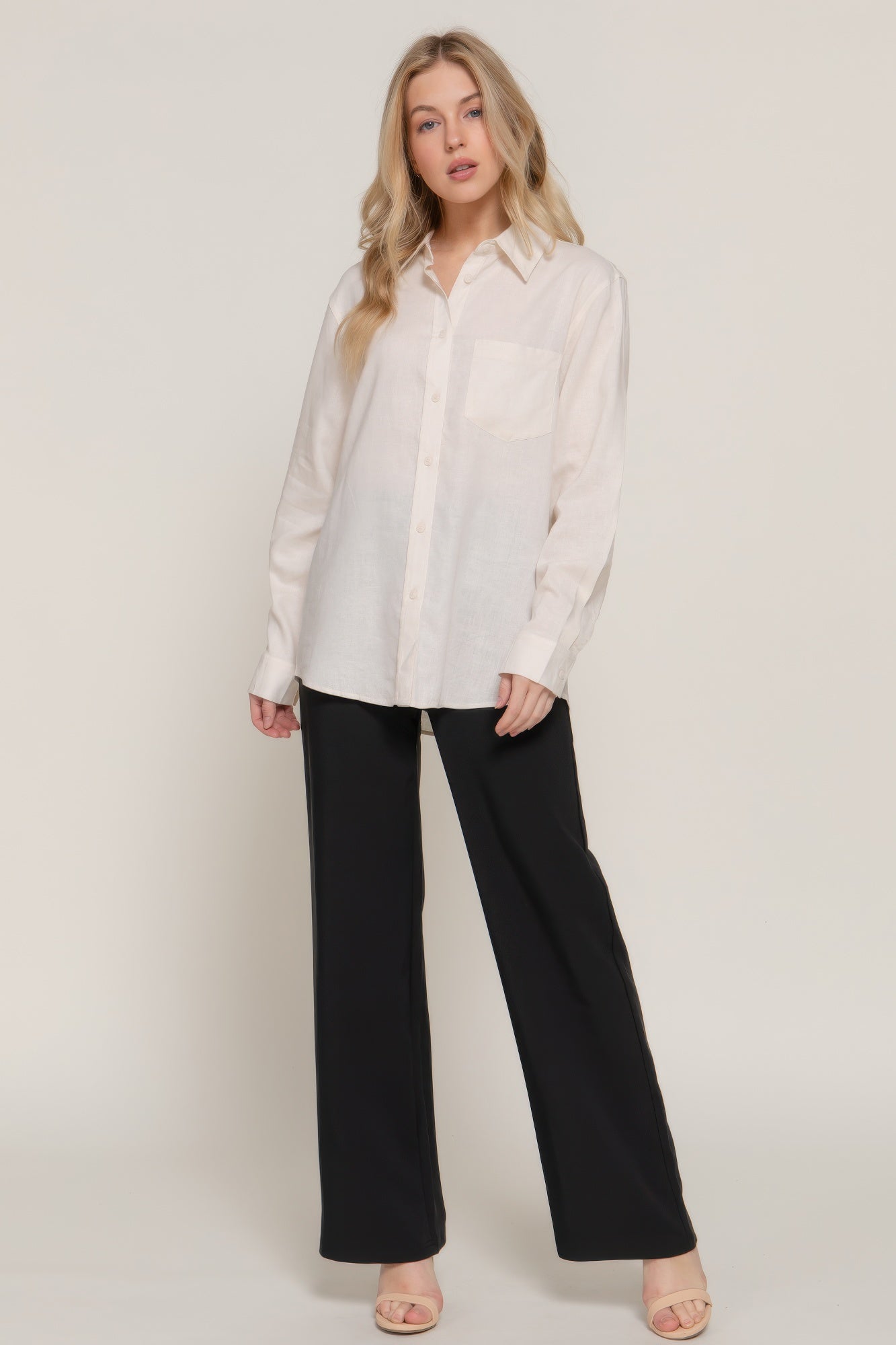 Natural long sleeve button-up linen blend shirt with collar; worn untucked