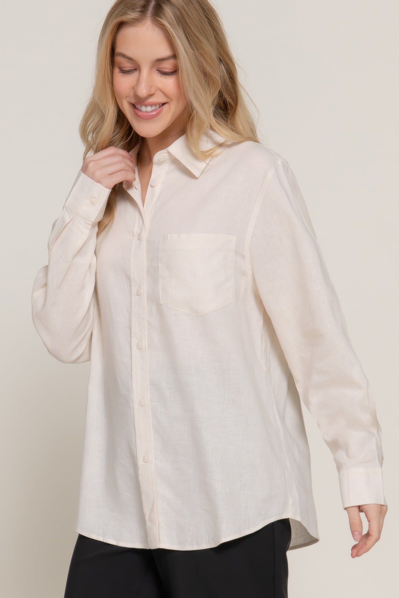 Natural long sleeve linen blend shirt close-up; pointed collar and front buttons