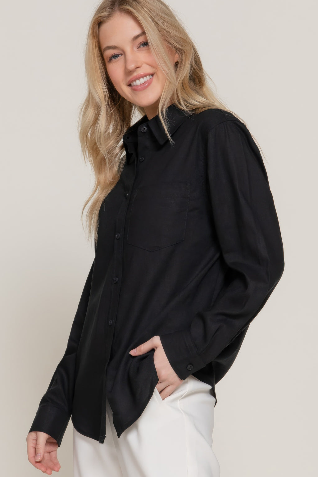 Black long sleeve linen blend shirt side/back angle; button placket visible