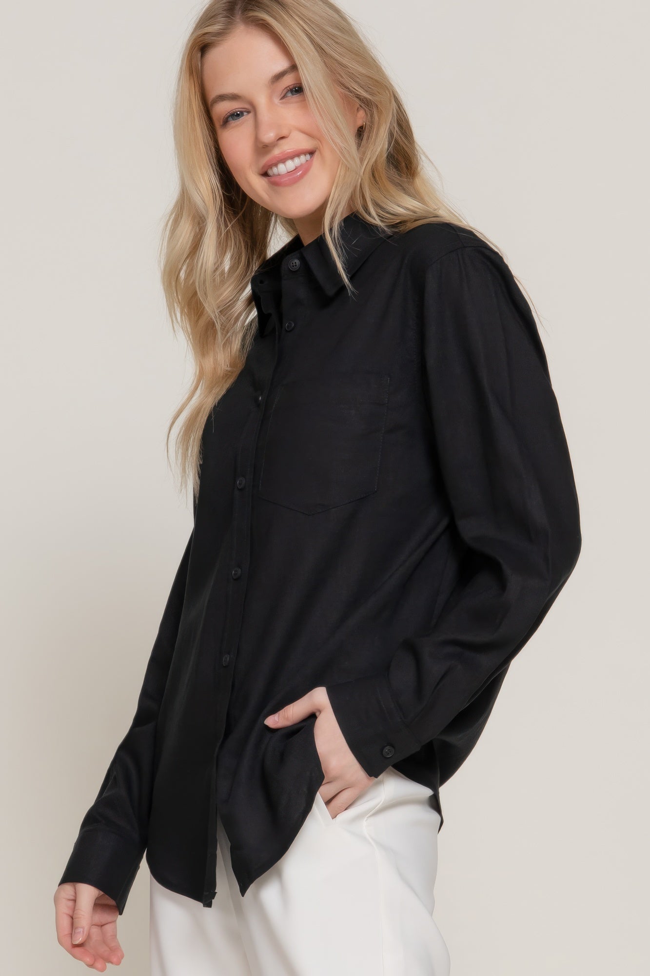 Black long sleeve linen blend shirt side/back angle; button placket visible