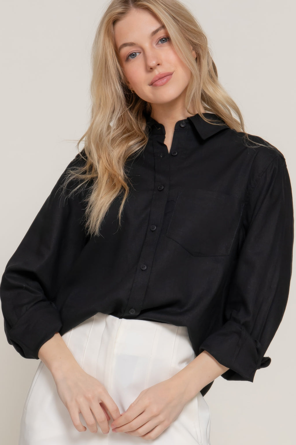 Black long sleeve linen blend shirt front view; collar and chest pocket