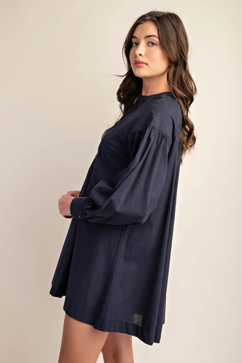 Navy mini dress with lace yoke and long balloon sleeves, flared skirt