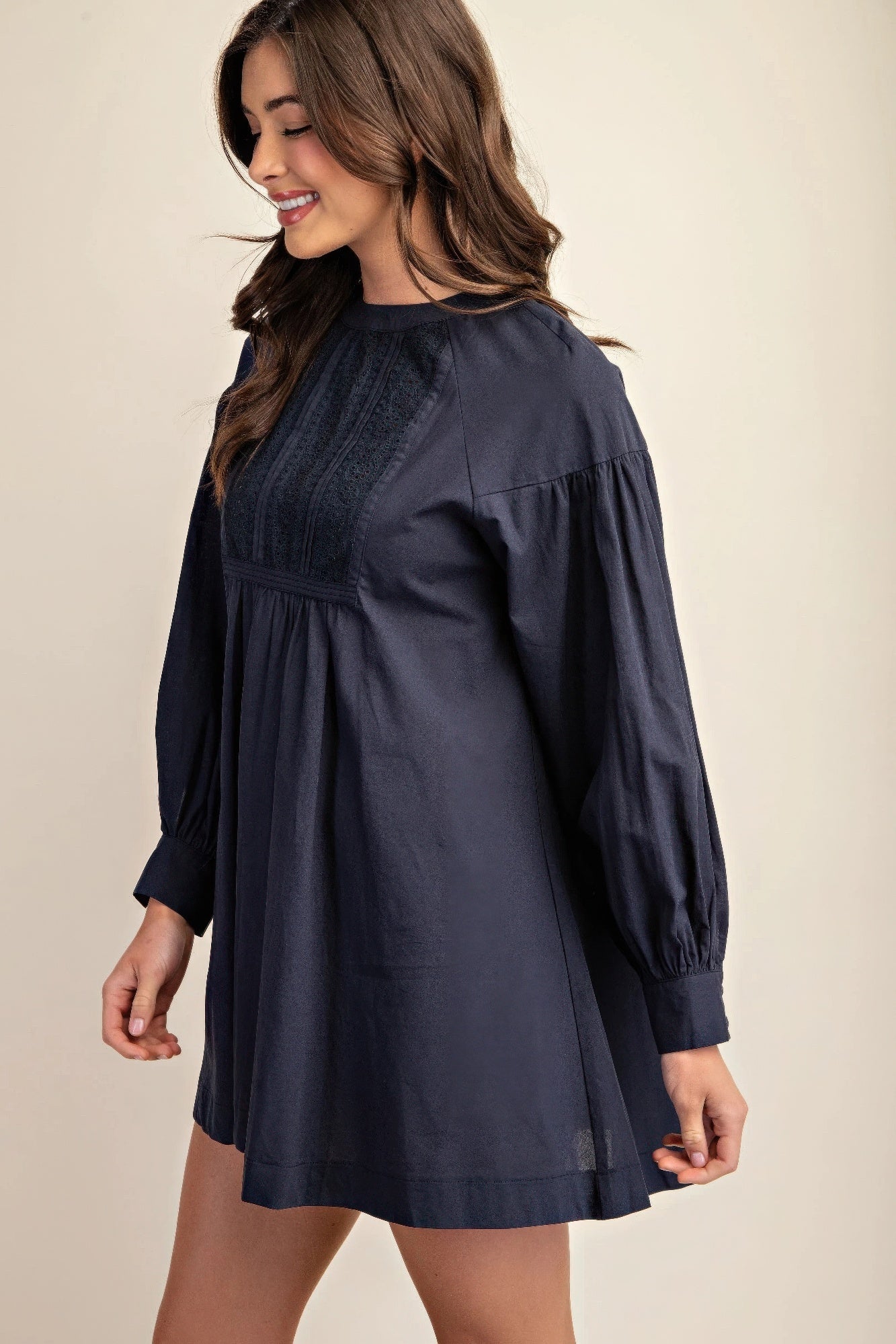 Navy lace yoke mini dress with long sleeves, gathered bodice and A-line hem