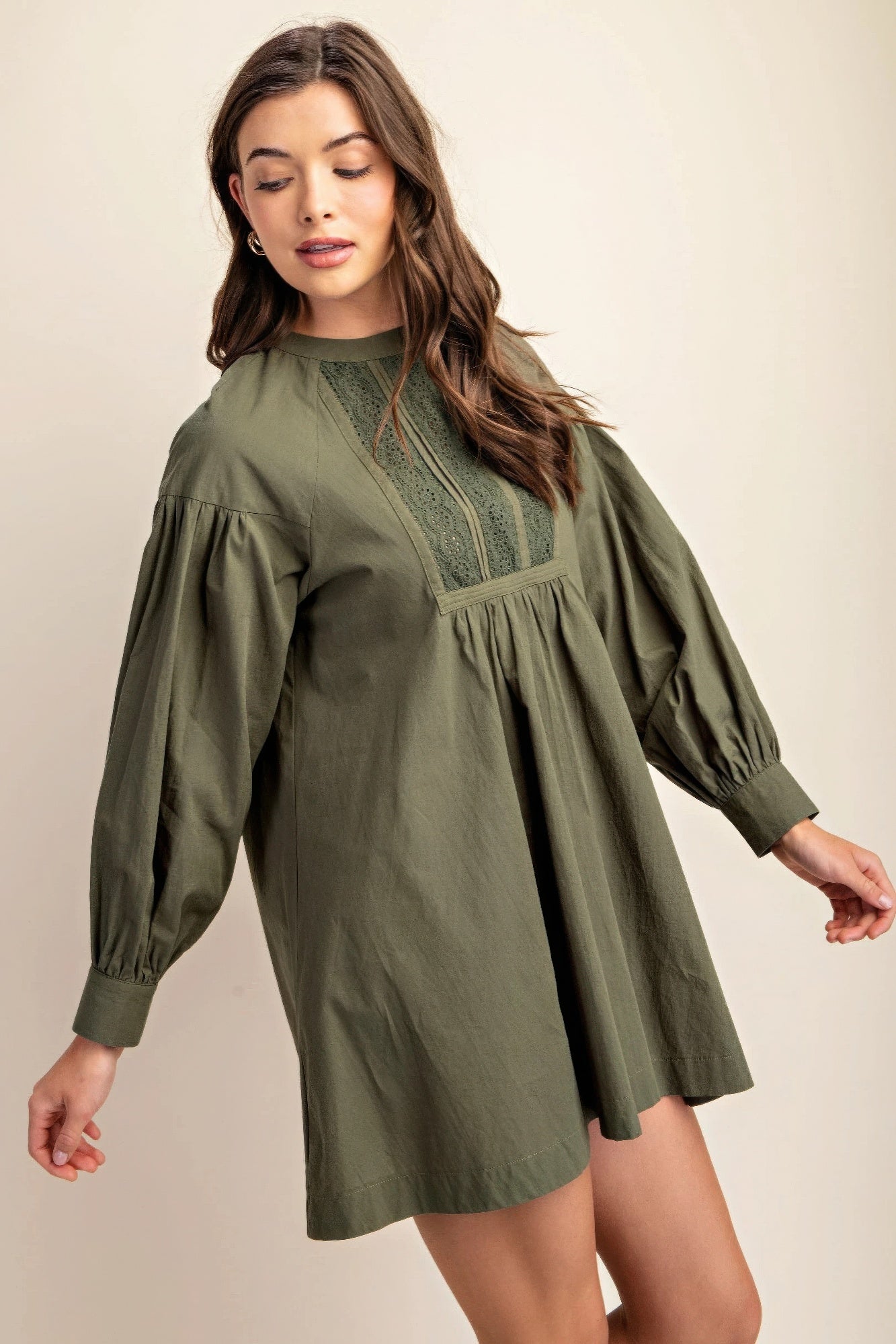 Olive long-sleeve mini dress with lace front panel and puff sleeves