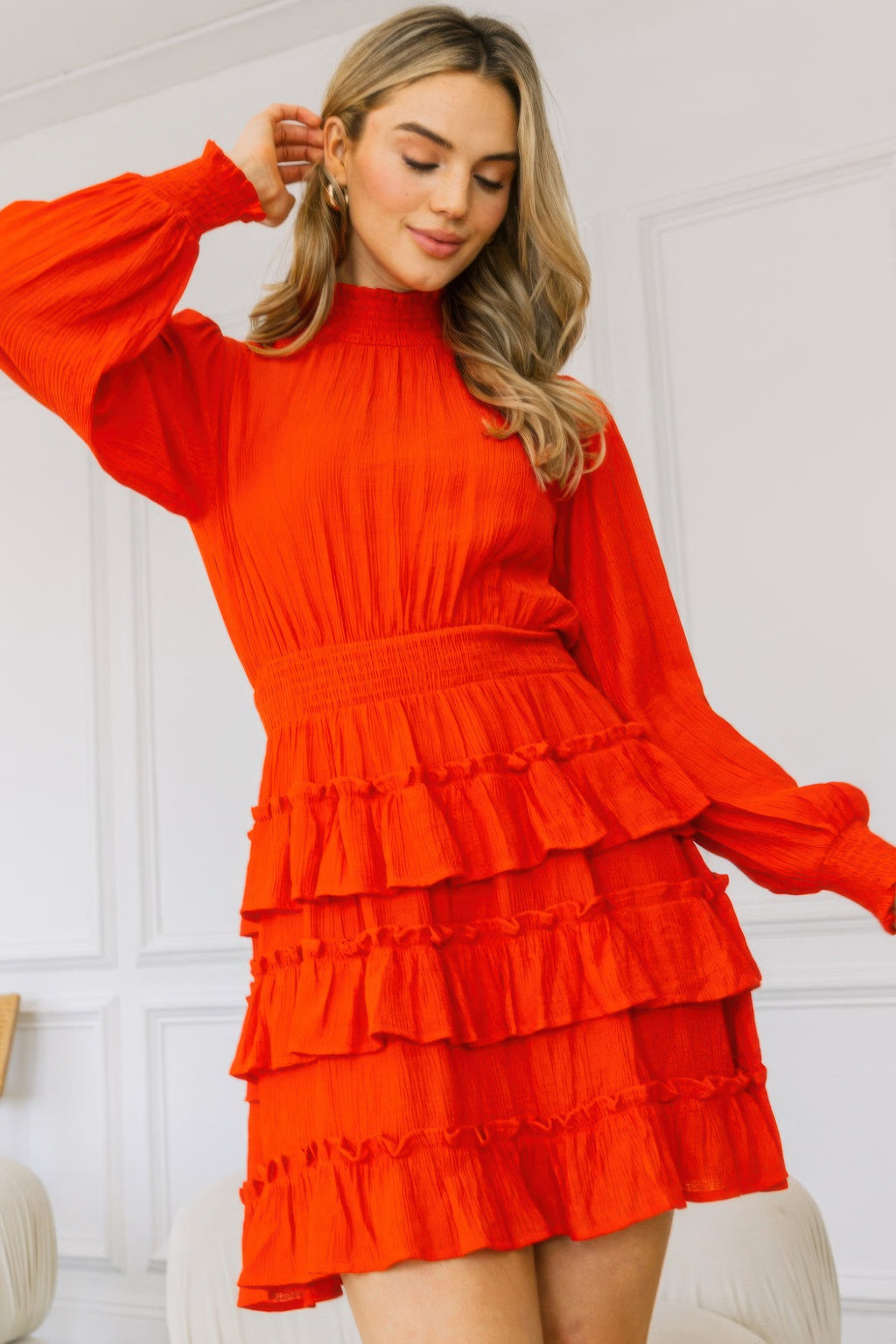 Red tiered ruffle mini dress, smocked bodice and long puff sleeves detail