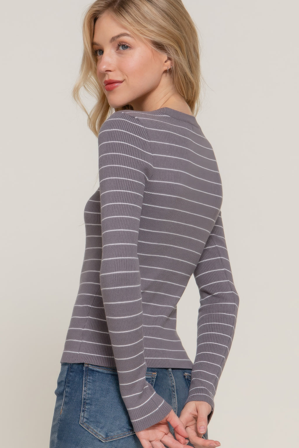 Long-sleeve crew neck striped sweater, grey/white stripes, back/side view