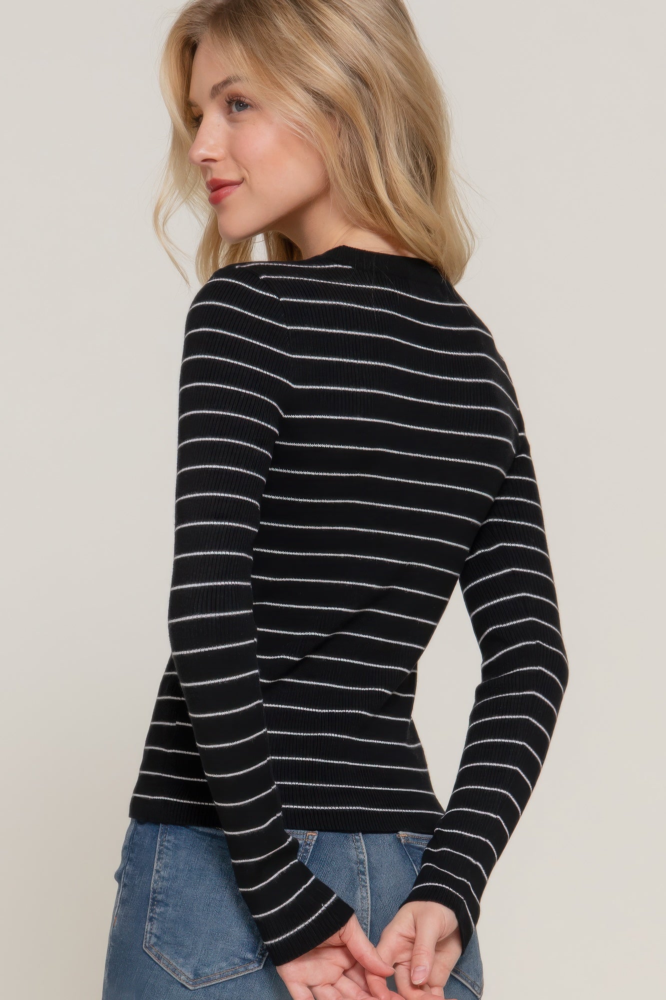 Long-sleeve crew neck striped sweater, black/white stripes, back view