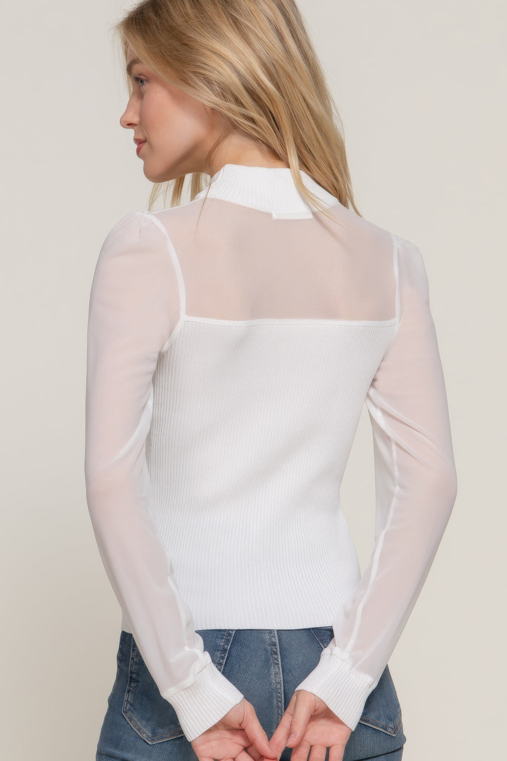 Off-white back view: sweater top with sheer mesh yoke and long sleeves