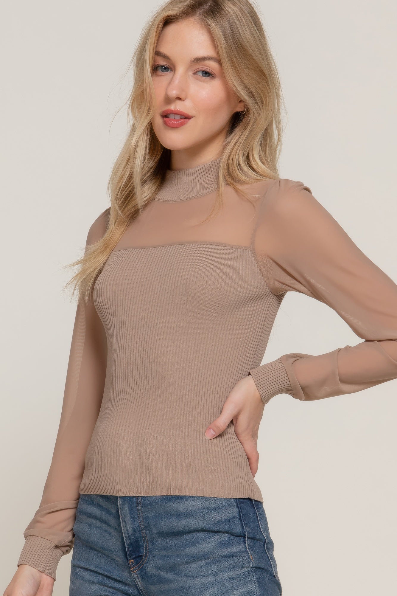 Khaki sweater top with high neck and sheer mesh panel on the front