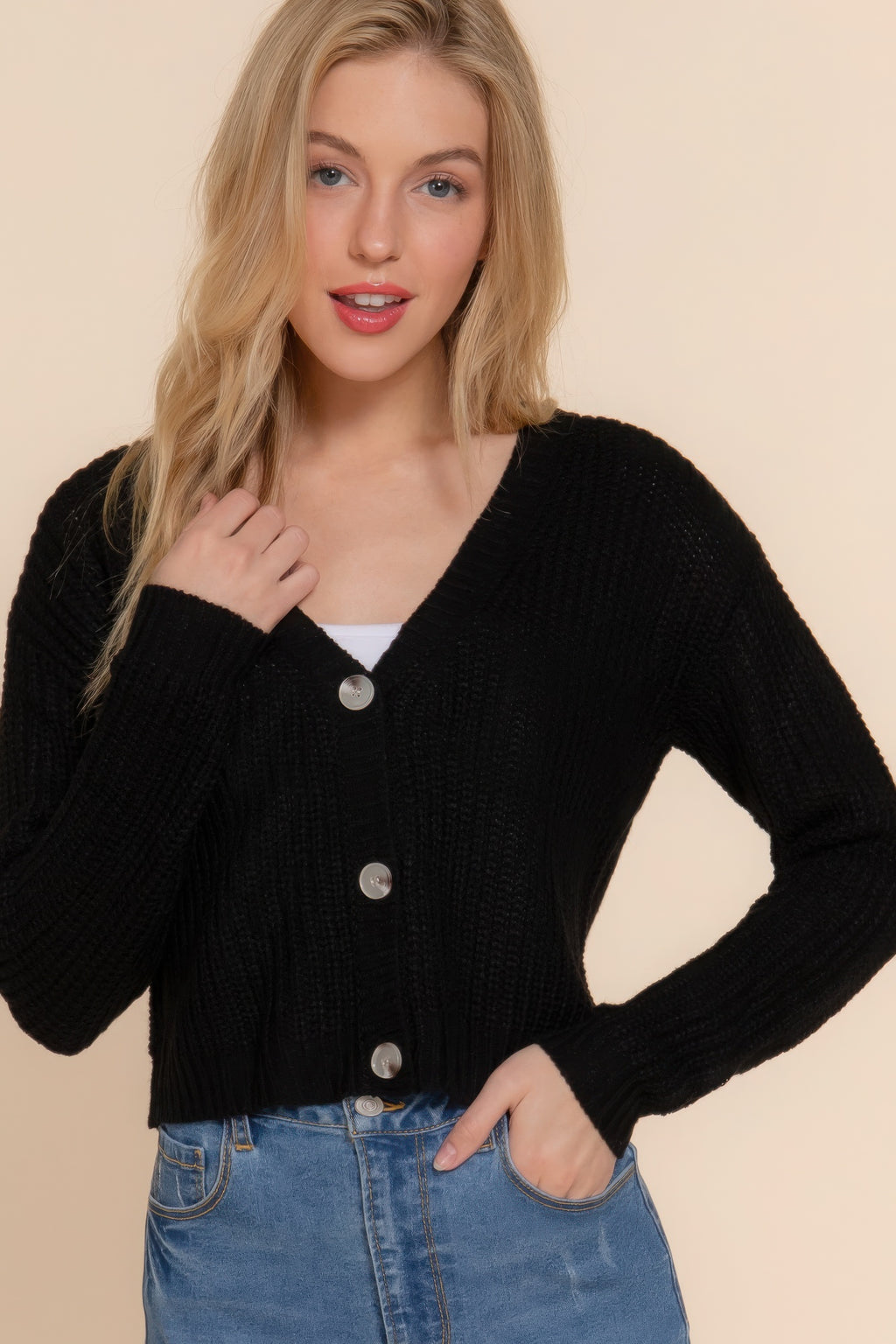 Black V-neck cardigan sweater with front buttons and long sleeves, ribbed knit hem