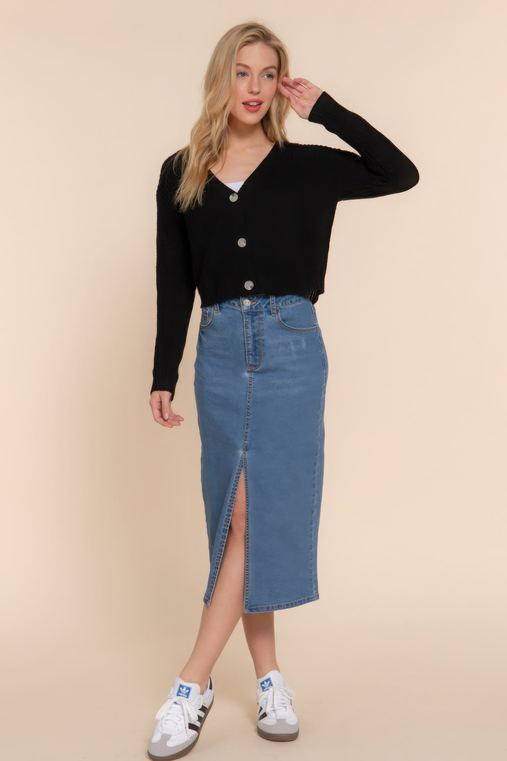 Black long-sleeve V-neck cardigan with button placket and cropped length
