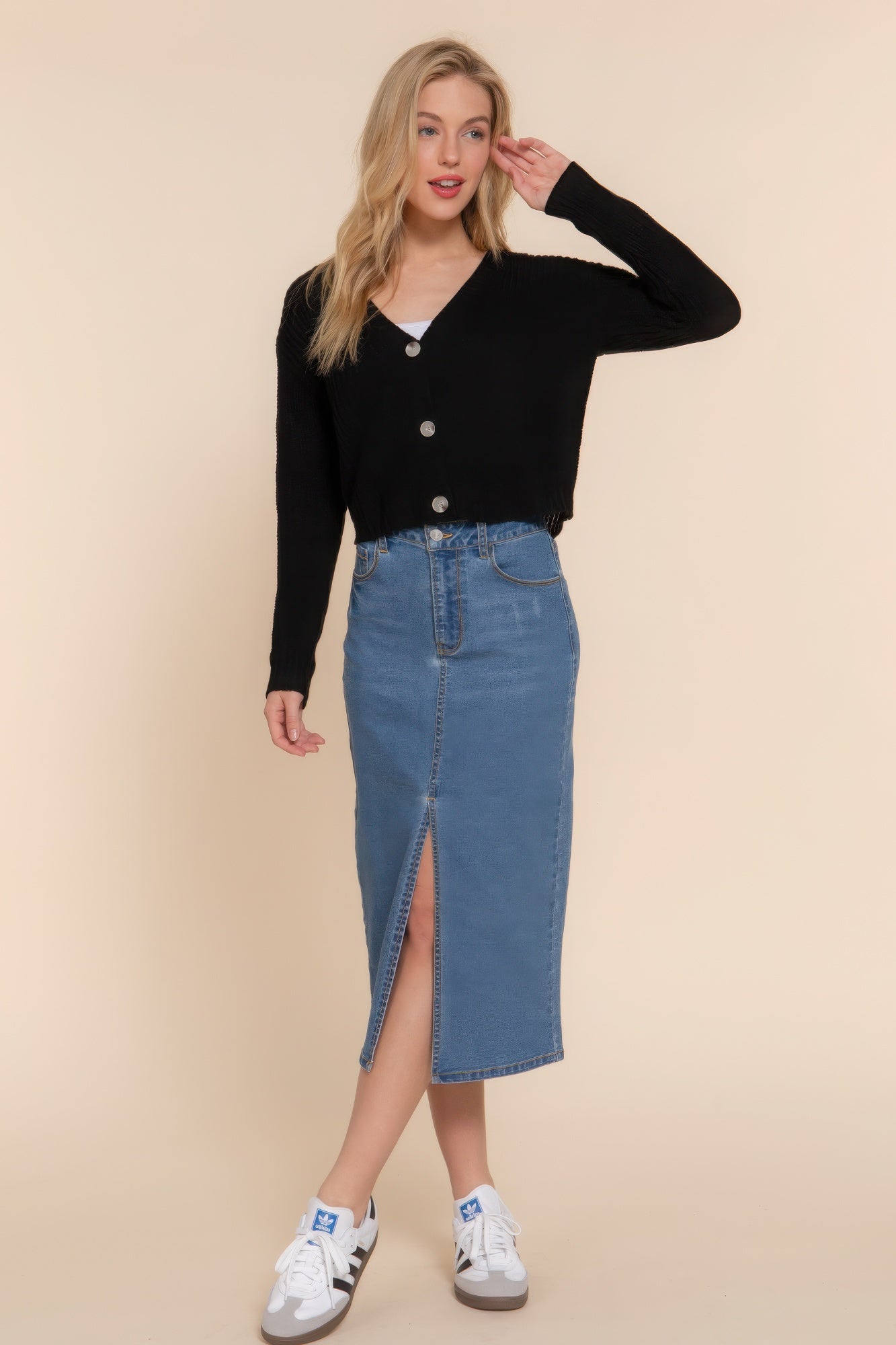 Black long-sleeve V-neck cardigan with button placket and cropped length