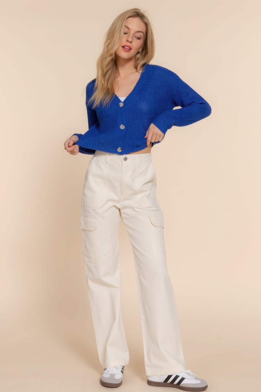 Blue long-sleeve V-neck cardigan with button placket and cropped hem
