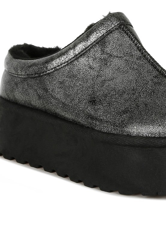 Metallic silver slip-on platform with thick sole and stitched side panel detail