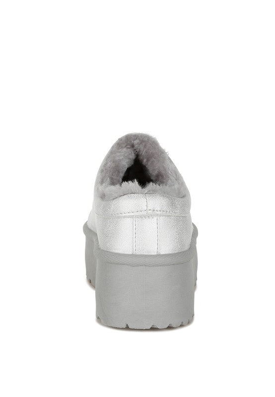 Light silver slip-on platform shoe back view with fuzzy collar and thick sole
