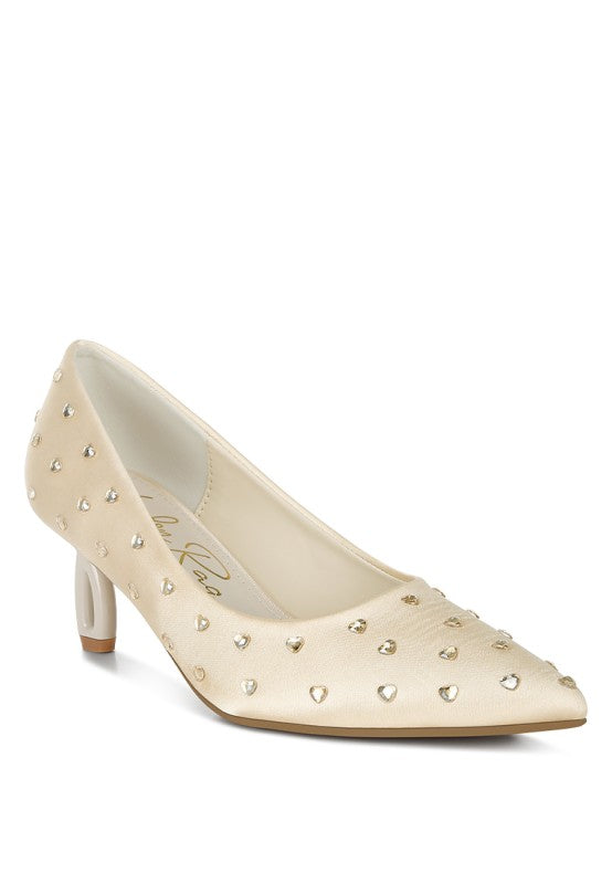 Beige heart-rhinestone pointed-toe pumps with a mid-height block heel