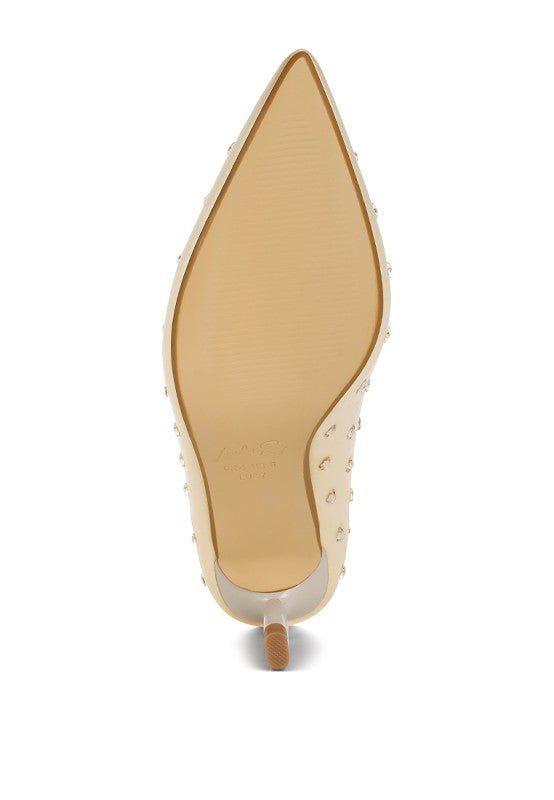 Beige heel view of heart-rhinestone pumps with pointed toe and block heel