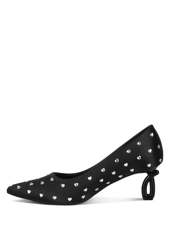 Black pointed-toe pumps with scattered heart rhinestones and curved low heel
