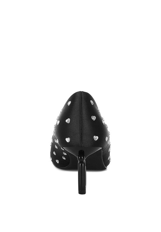 Back view of black pumps with heart rhinestones and stiletto heel