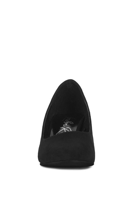 Malai Block Heel Pumps in Black, back view of closed pointed-toe pump