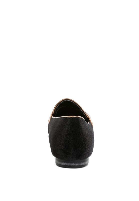 Black velvet loafers, rear view with closed round toe and metallic penny strap