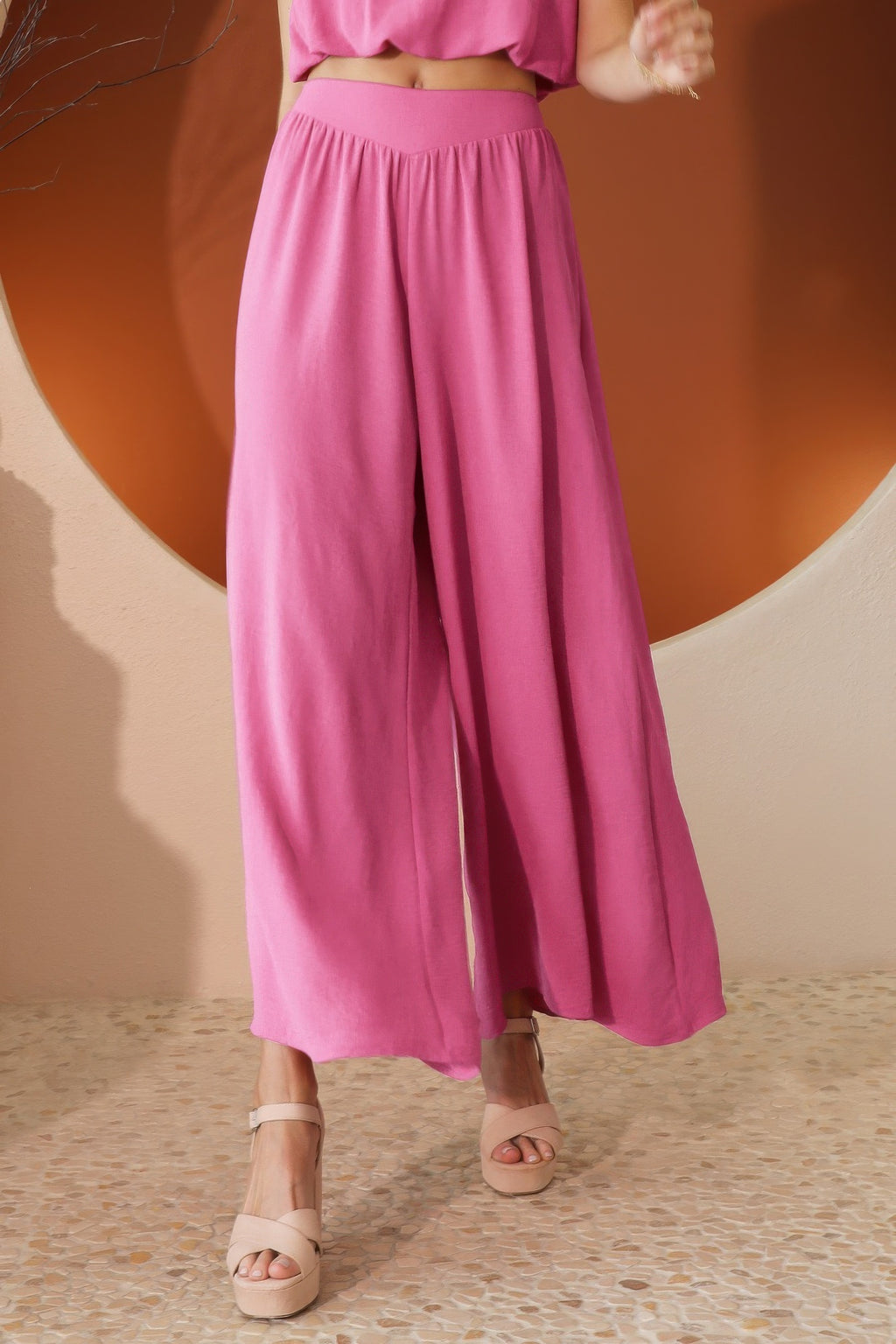 Pink matte crepe wide-leg swing pants with elastic waistband, flowy wide legs