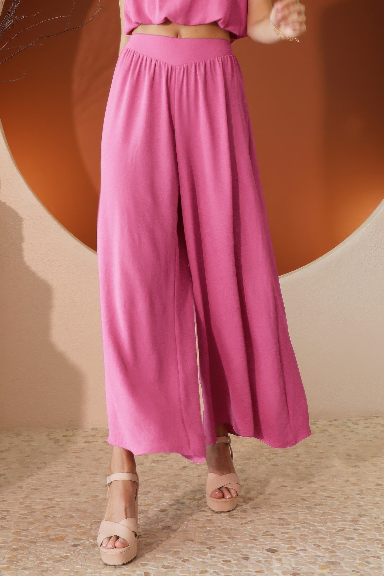 Pink matte crepe wide-leg swing pants with elastic waistband, flowy wide legs