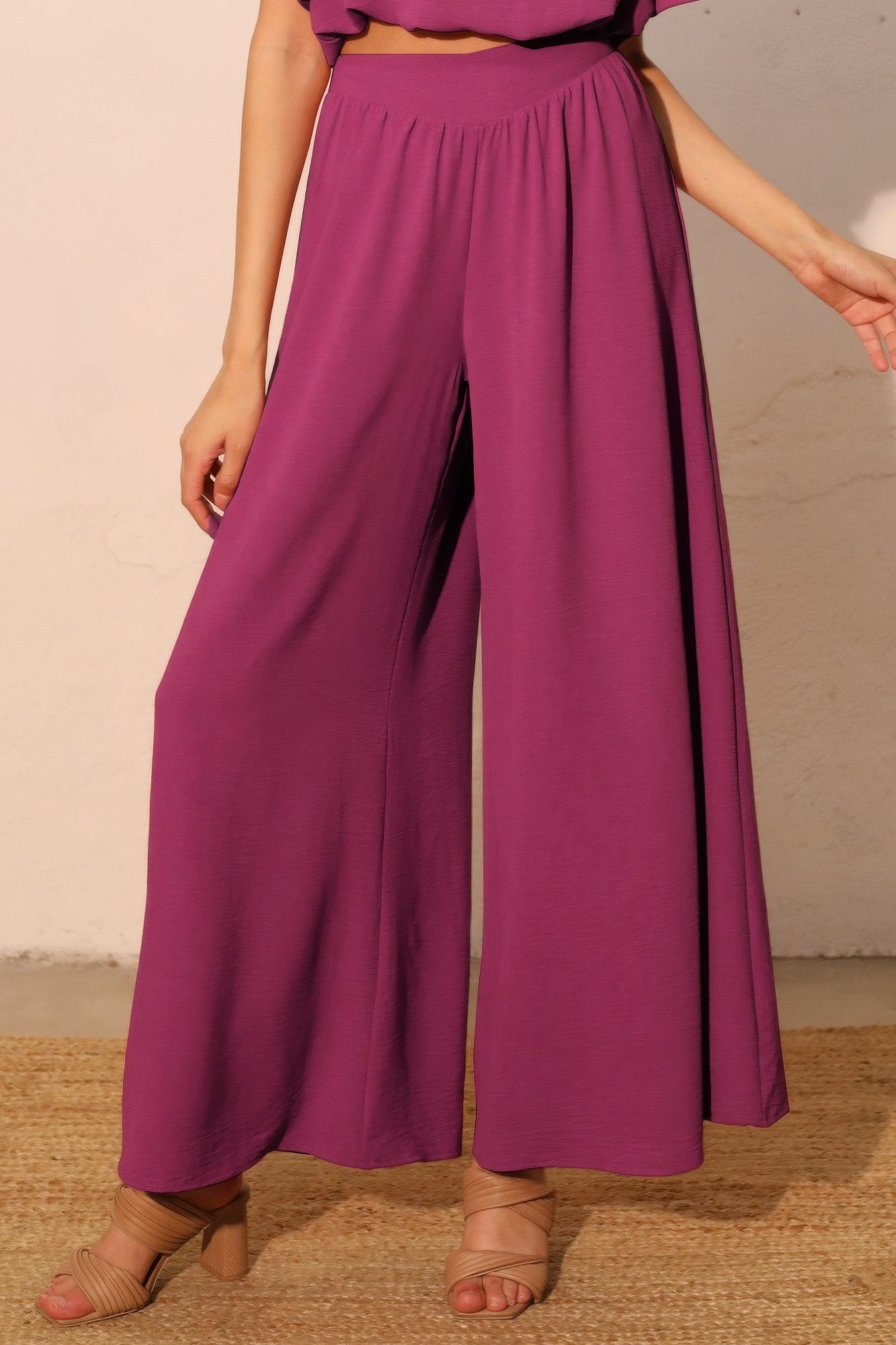Plum matte crepe wide-leg swing pants with elastic waistband, skirted wide legs