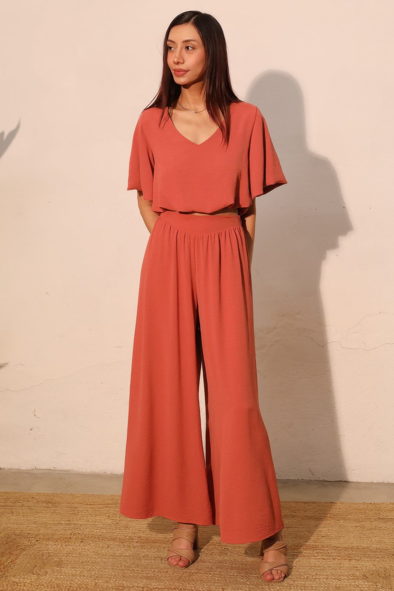 Rust wide-leg swing pants, elastic waistband and flowing wide-leg fit