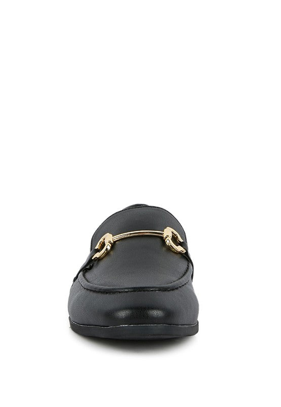 Black faux leather loafers from heel-toe view with gold-tone horsebit hardware.