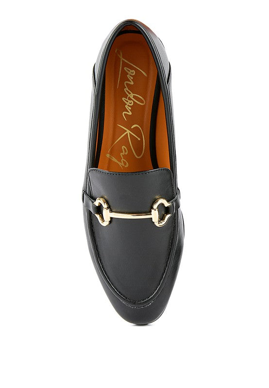 Black faux leather loafer interior lining view, gold-tone horsebit strap on upper.