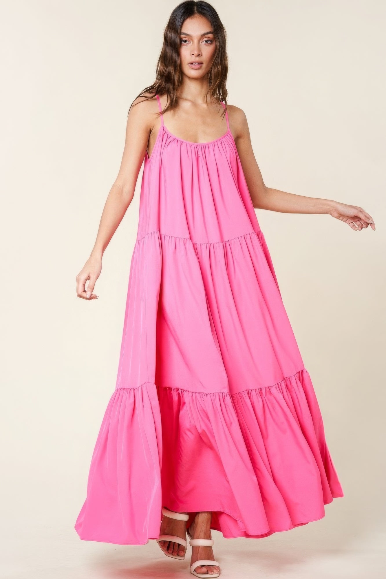 Pink tiered maxi sundress with spaghetti straps and gathered bodice