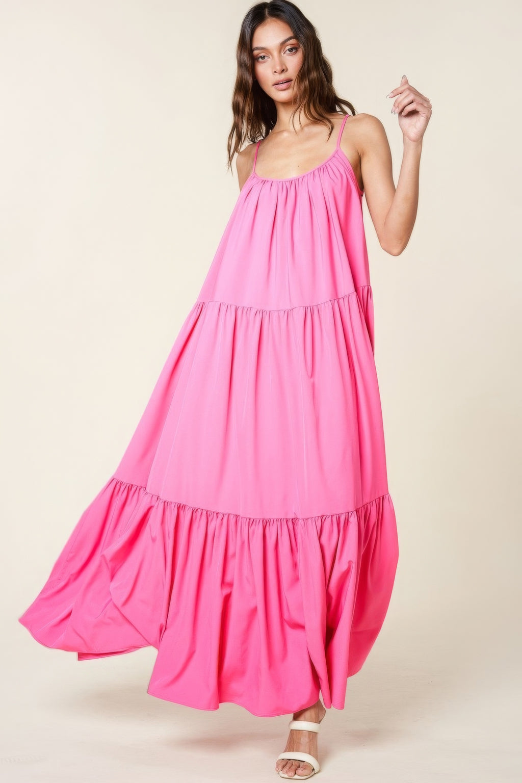 Pink maxi sundress with tiered skirt panels and thin spaghetti straps