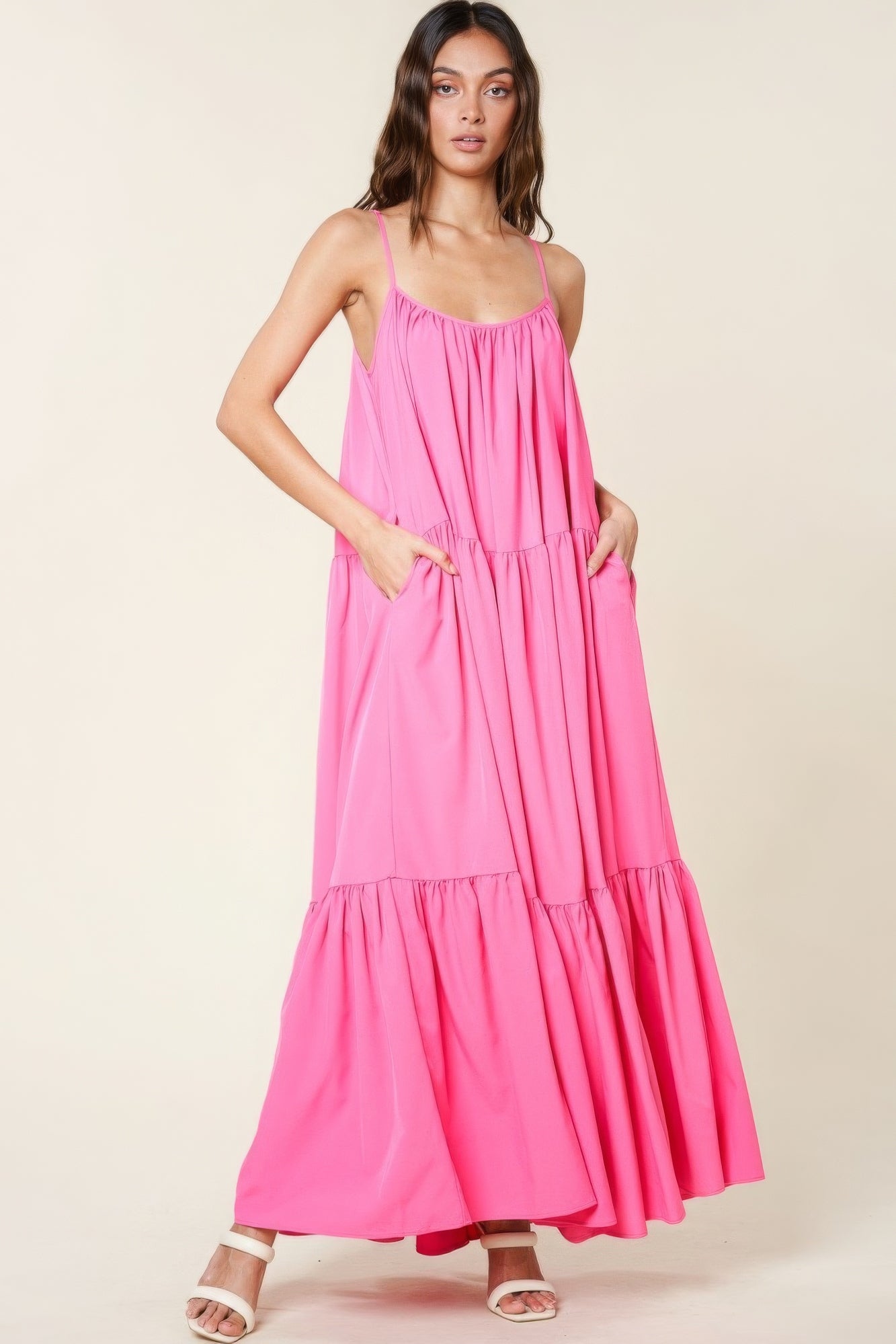 Pink tiered maxi sundress with empire waist seam and fluttering tiered hem