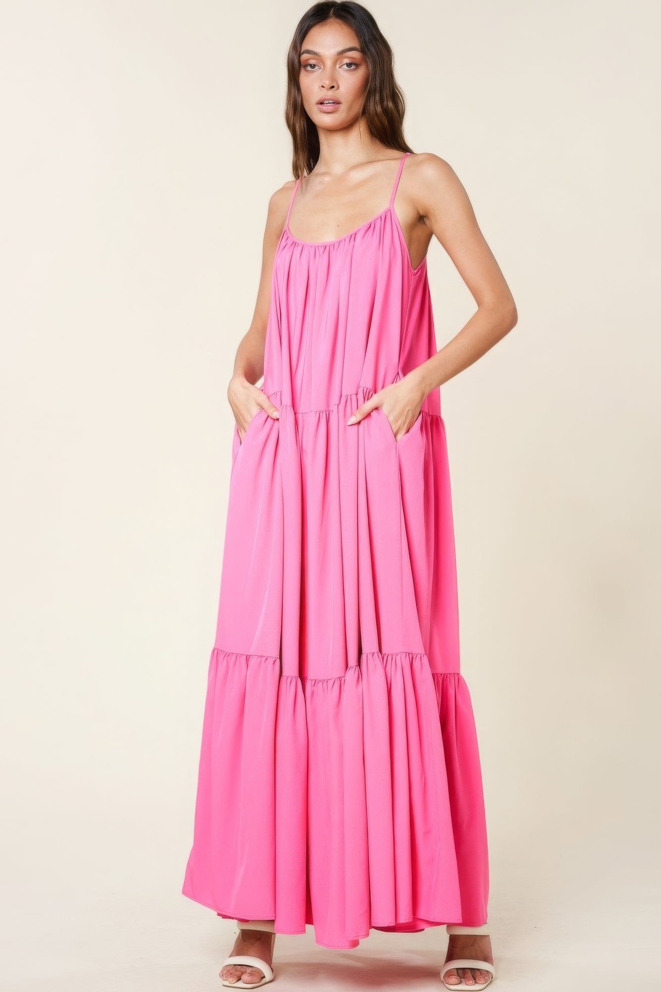 Pink sleeveless maxi sundress with scoop neckline and tiered ruffle layers