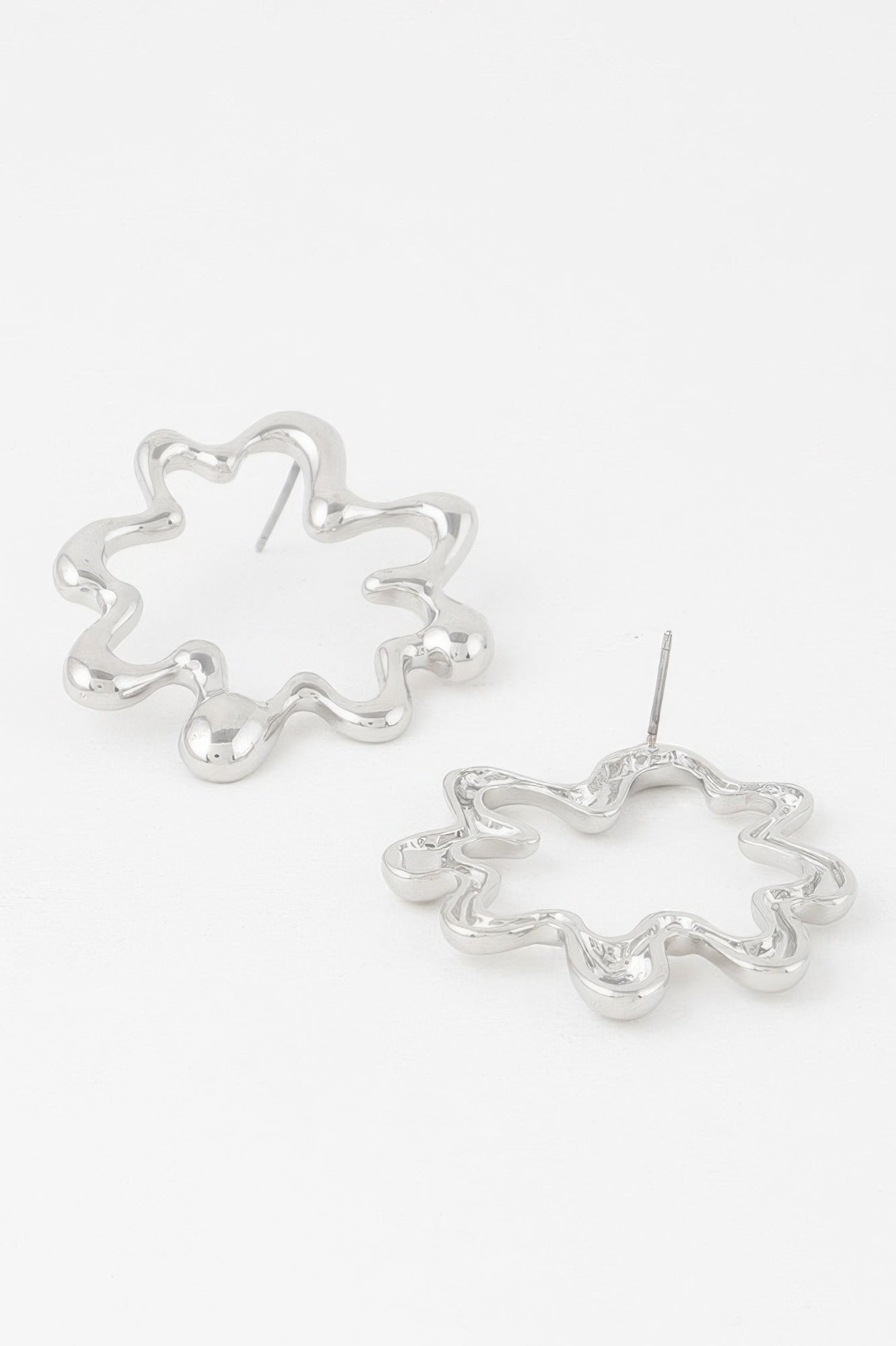 Melting circular hoop earrings, silver-tone wavy flower shape