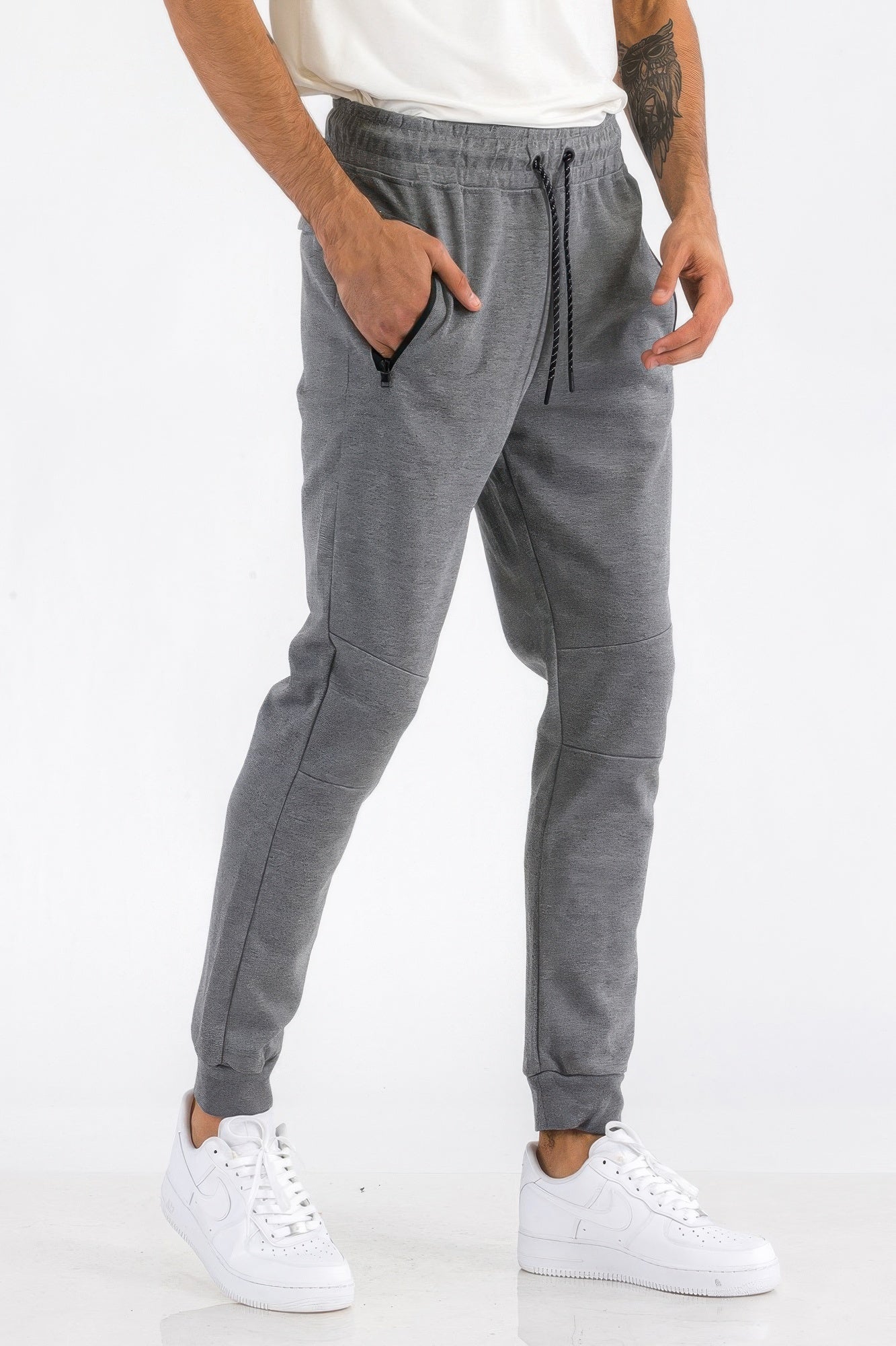Men's heathered jogger pants in charcoal gray with drawstring waist and front pockets