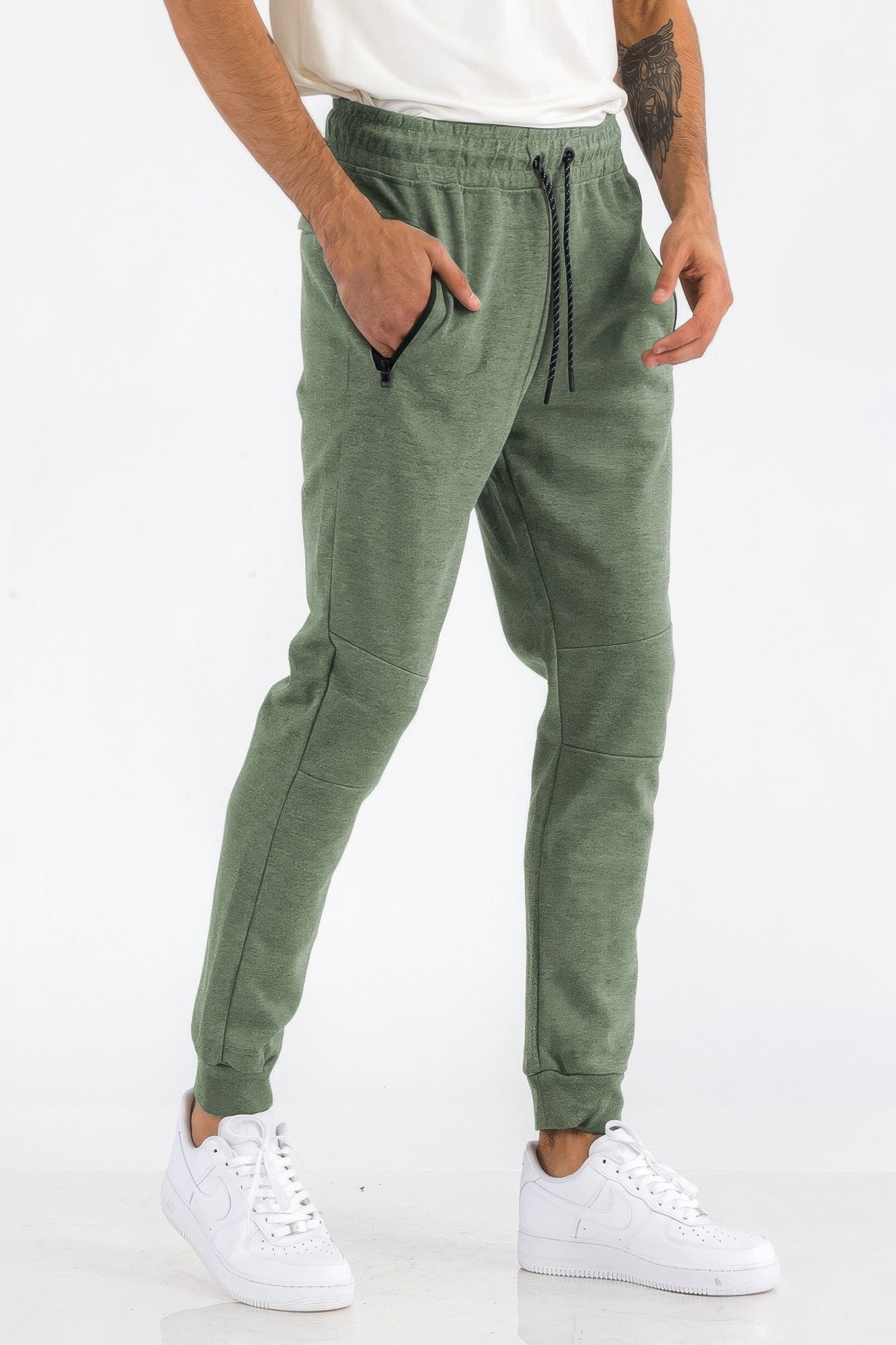 Men's heathered jogger pants in olive green with drawstring waist and front pockets