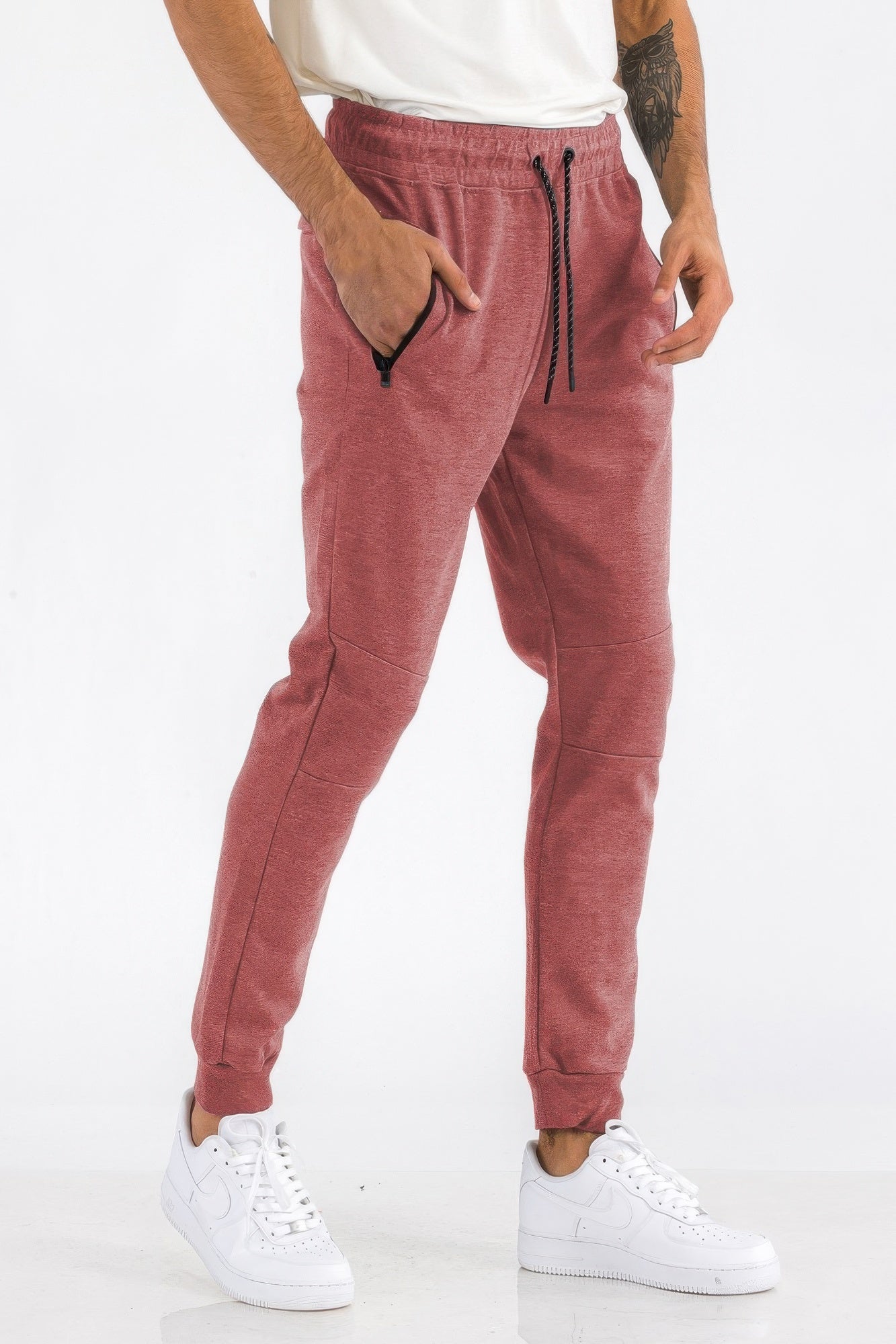 Men's heathered jogger pants in heathered red with drawstring waist and front pockets