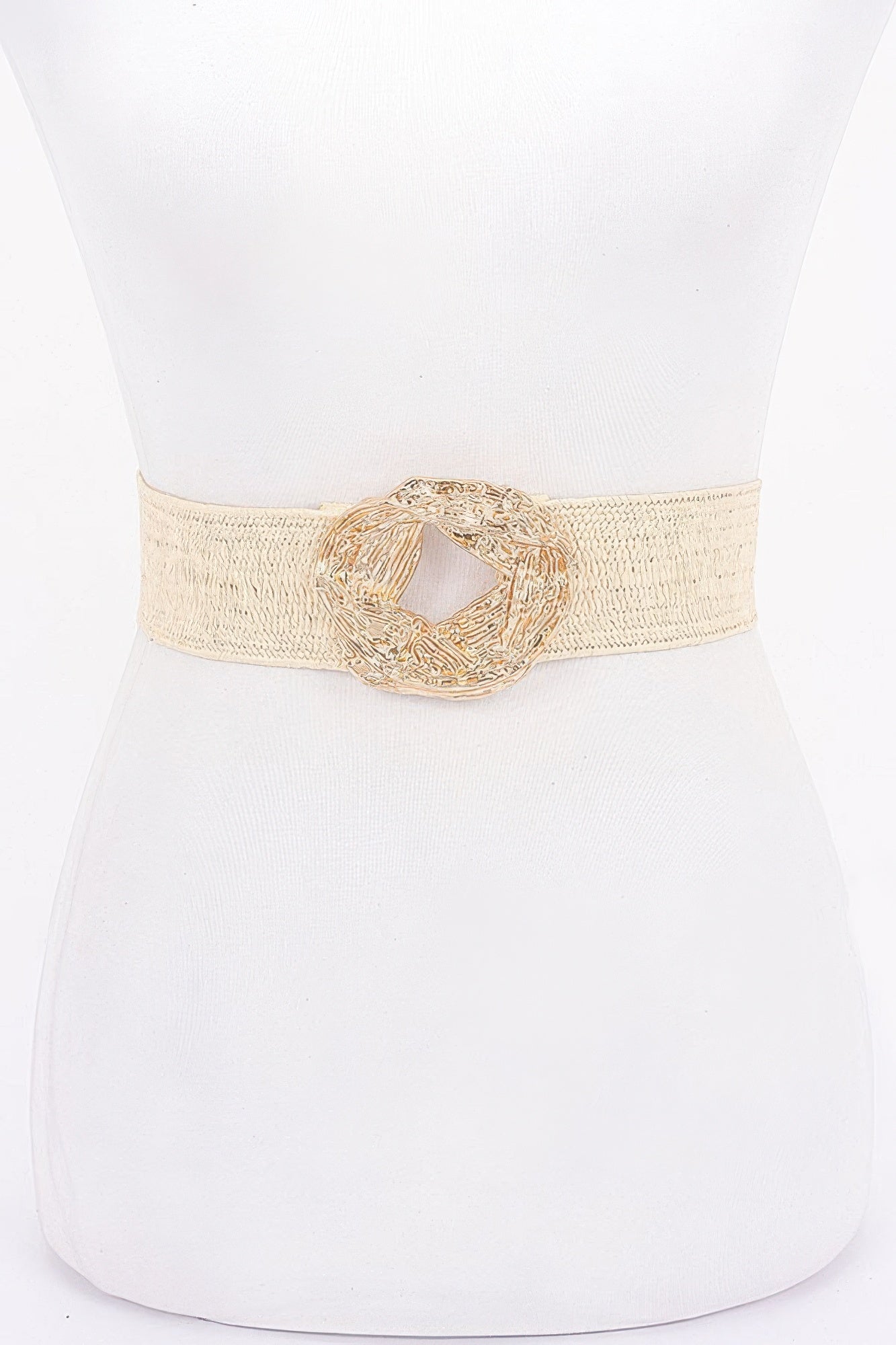 Beige elastic belt with large oval gold-tone metal buckle at center