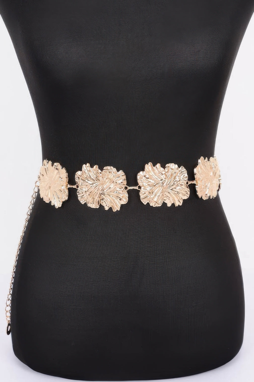 Gold metal chain belt with textured flower links, adjustable fit at waist