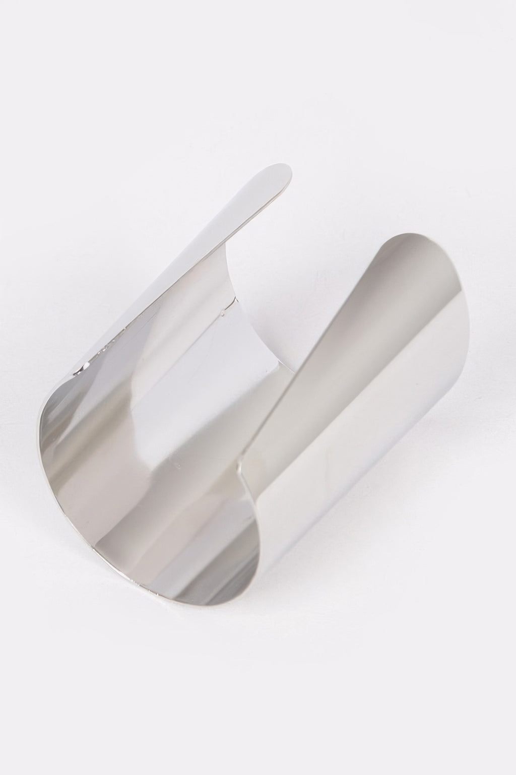 Silver metal cuff bracelet, side view of wide cuff with inner gap