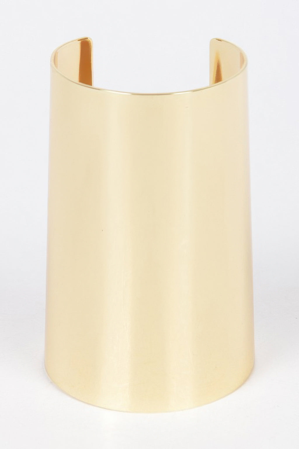 Gold metal cuff with smooth open band, wide smooth edges