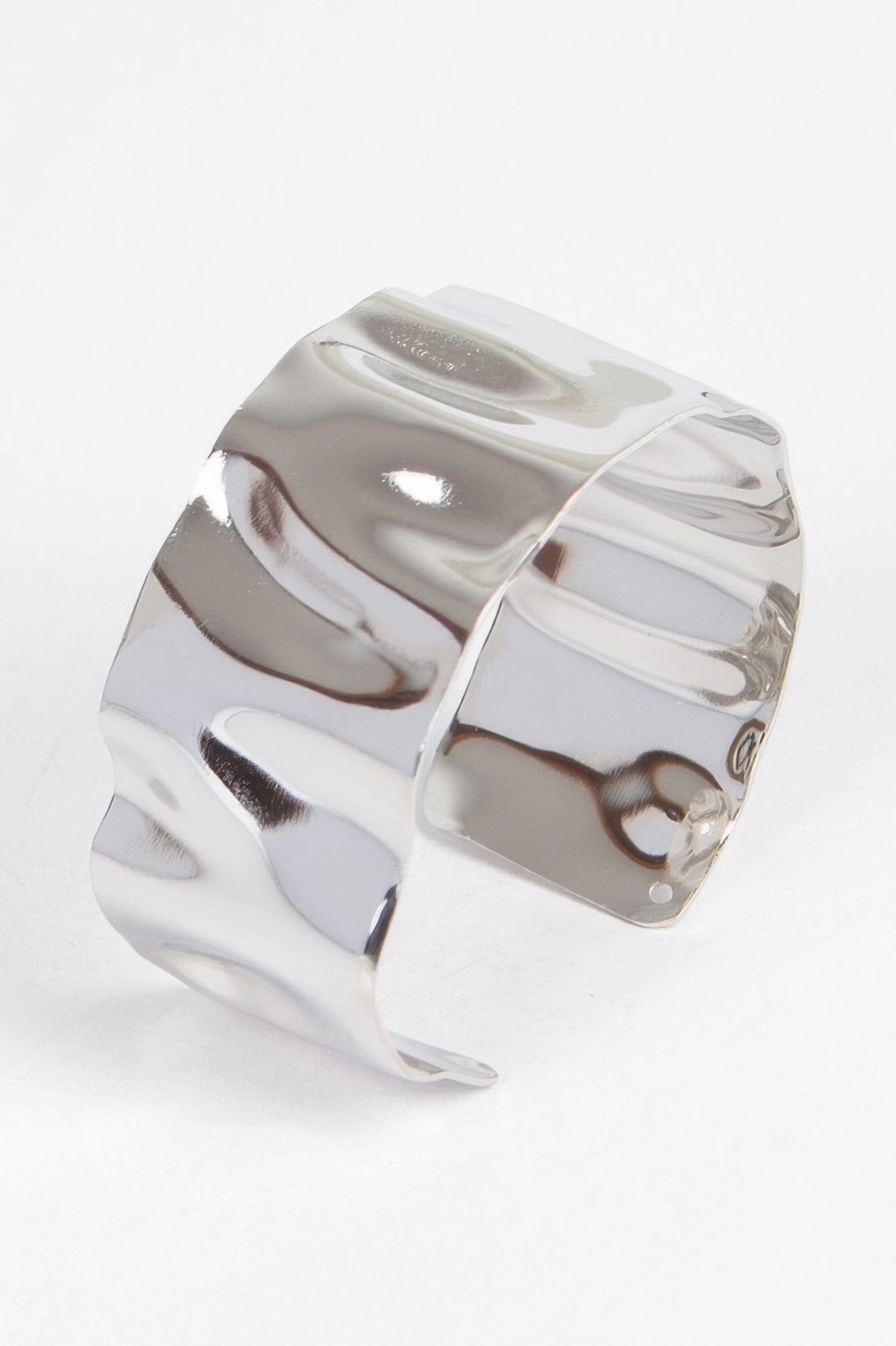 Metal cuff bracelet in silver tone, wide band with adjustable open ends